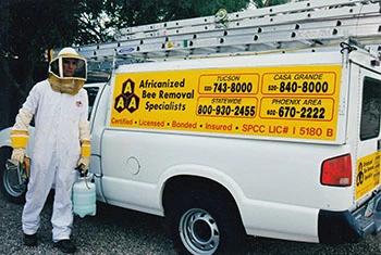 Pinal County bee removal service truck and employee